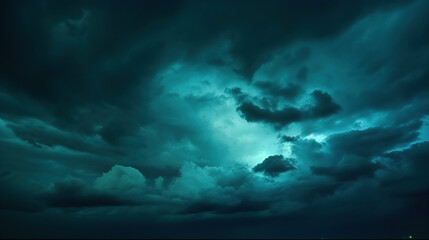 Obraz premium Dark teal cloudy sky. Night skies with clouds. Gloomy sky background for design.