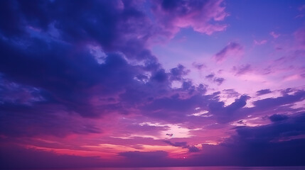 Naklejka na ściany i meble Deep purple magenta violet navy blue sky. Dramatic evening sky with clouds. Colorful sunset background for design. Dark shades. Cloudy weather. Storm. Fantasy fantastic.