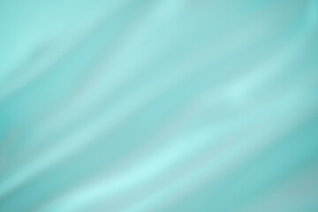 Modern bright green fabric stripes blurred background