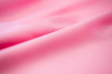 Modern bright pink fabric stripes blurred background