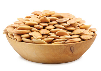 Pumpkin seeds in a cup isolated on white background