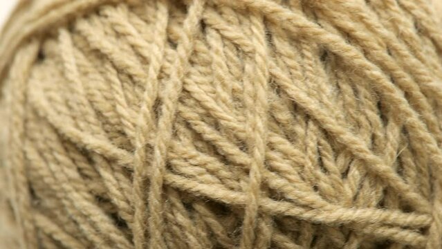 Simple brown ball of tangled string object detail, extreme closeup detail, natural organic string macro, up close shot, nobody, no people. Jumble, entanglement and confusion symbol, abstract concept