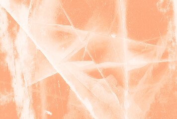 Abstract background cracked ice trending color of year 2024 Peach Fuzz.