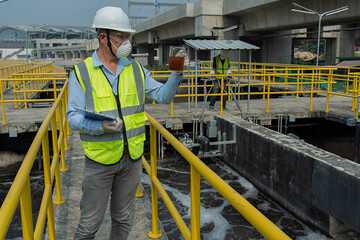 worker on Wastewater treatment concept. Service engineer on  waste water Treatment plant
