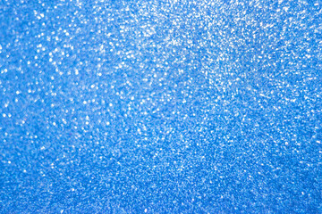 Blue bokeh. Defocused abstract blue background, holiday concept