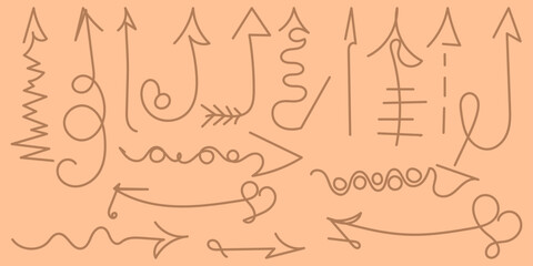 Obraz premium Colorful Doodle set of hand-drawn brown arrows isolated on peach background. Peach fuzz. Editable stroke. Multicolored vector illustration for cards, business, banners, logotypes, textile
