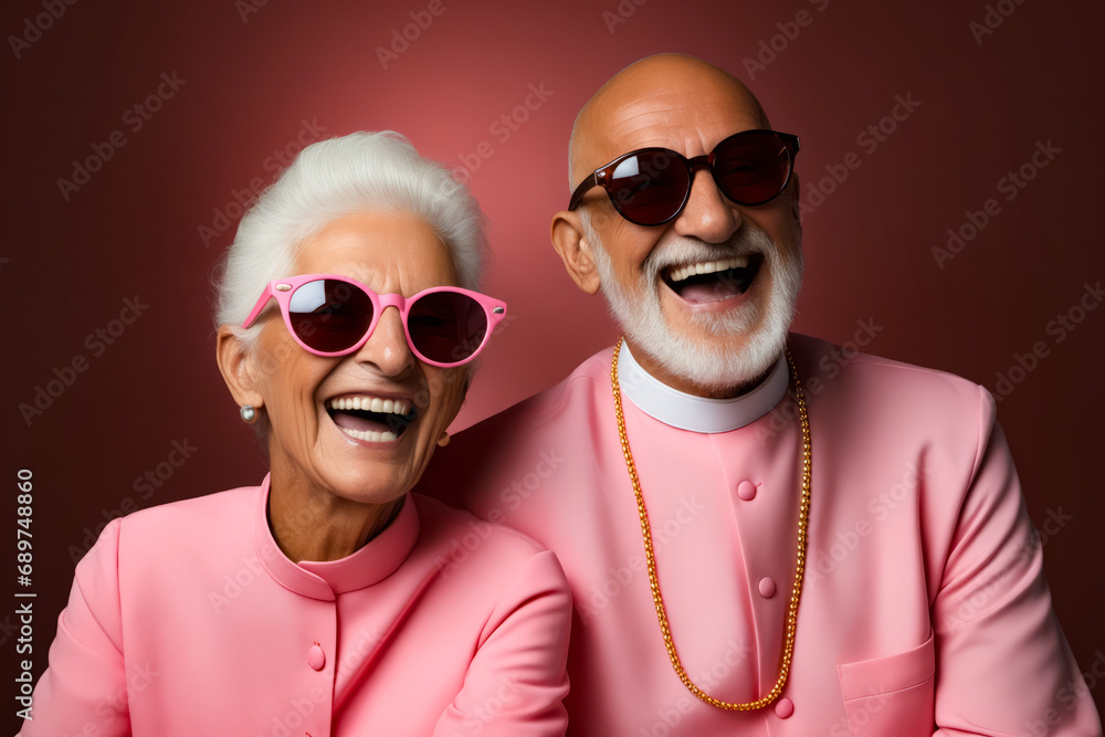 Poster Man and woman wearing pink sunglasses and pink outfit.