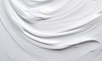 A smooth, swirling texture of silver paint with elegant waves and creamy details.