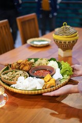 The traditional food Nasi Liwet from Bandung, Indonesia