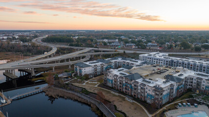 Obraz premium Aerial view of downtown Wilmington during sunrise.