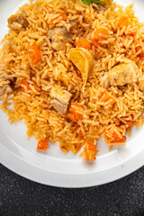 rice pilaf meat tasty fresh pork meat eating cooking appetizer meal food snack on the table copy space food background rustic top view