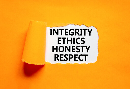 Integrity ethics honesty respect symbol. Concept word Integrity Ethics Honesty Respect on beautiful white paper. Beautiful orange paper background. Business integrity ethics honesty respect concept.