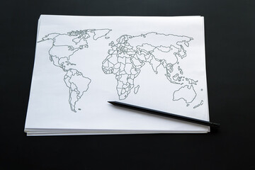 A hand-drawn world map is drawn with a pencil on a white piece of paper against a dark background. World news, state borders, political news