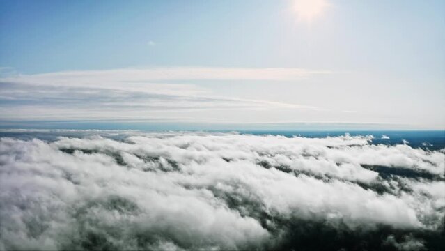 Cloud Haven, A Serene Passage Through the Gentle Sky Ocean. Aerial Drone Shot
