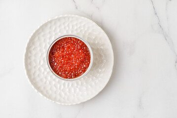 red caviar in a metal jar