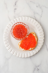 red caviar in the caviar bowl