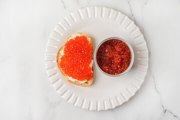 red caviar in a metal jar