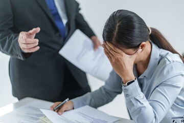 woman Getting scolded by mentor boss in the office.