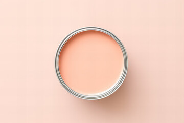 open can of wall paint with color of the year 2024 peach fuzz on a pastel peach background