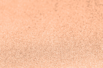 Peach fuzz, color of the year 2024, wave shiny glitter paper texture. Shining luxurious fabric....