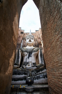 Old statue of buddha in sukhothai, thailand