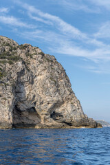 Fototapeta na wymiar steep worn cliffs of Avoltore cape, Argentario, Italy