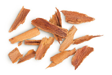 Cinnamon sticks crushed isolated on a white background. Top view. Flat lay.