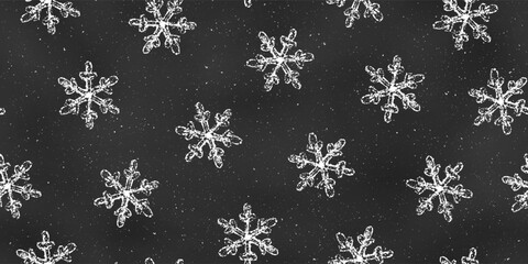 Seamless Grunge Pattern of Chalk Drawn Sketches White Snowflakes on Dark Blackboard.