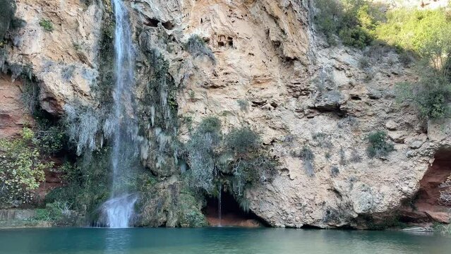 View on the La Cueva Turche de Bu&ntilde;ol  waterfall near Valencia from behind a waterfall