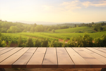 Wooden table for product presentation in front of a vineyard