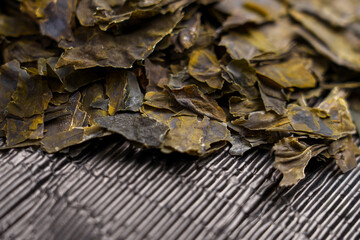 Dried kombu seaweed leaves. Traditional japanese dashi soup ingredient. Dry dehydrated algae