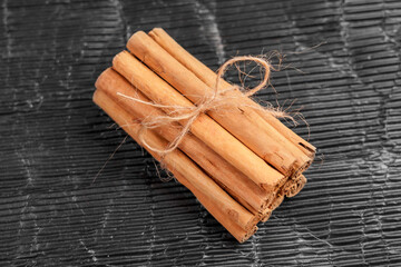 Cinnamon sticks tied with a natural string. Christmas ingredient