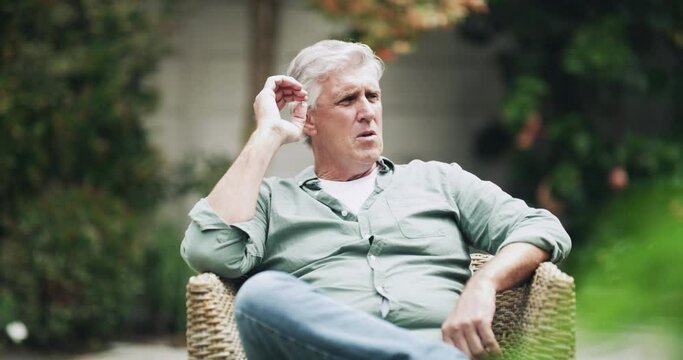 Garden, cannabis and smoking with senior man, weed and happy with weekend break, home and herbs. Nature, outdoor and mature guy with marijuana, cbd and backyard with thinking, hemp and retirement