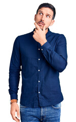 Young handsome man wearing casual shirt thinking worried about a question, concerned and nervous...