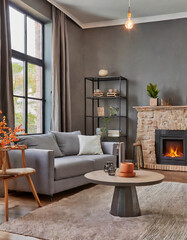 Fireplace decorated with stone tiles in minimalist interior design of modern living room with sofa