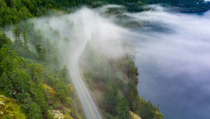 Naklejka na ściany i meble Sea to Sky Highway in Howe Sound. Aerial View Canadian Mountain Landscape on West Coast.