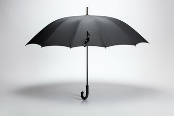 Opened black umbrella isolated on white background