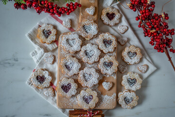 Linzer biscuits filled with red raspberry jam