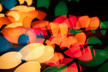Multiple exposure abstract photo of vintage Christmas lights on a black background