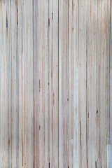 The background is made of wooden vertical strips of white lilac plywood. Construction of interior backgrounds.