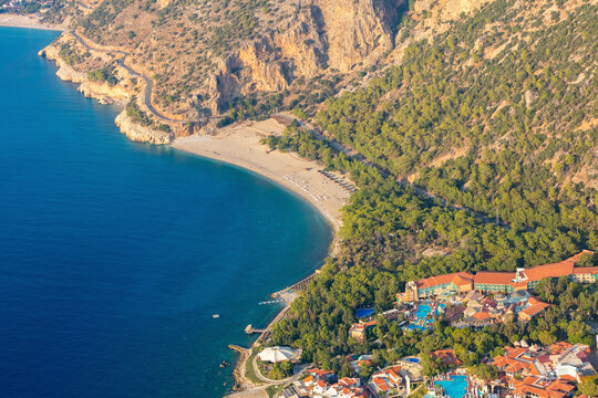 Aerial view Kidrak Beach next to Liberty Lykia Hotel in Oludeniz, Fethiye, Mugla, Turkey.