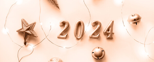 Color 2024. New Year's Eve peach fuzz, Color Christmas Tree Decorations and Gift for Happy New Year...