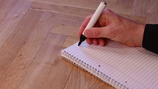 Blank notepad in class on wooden desk for student learning English written language. Language subject for adult learning with handwritten notes and writing exercises for personal development