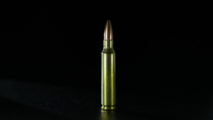 bullet on black background