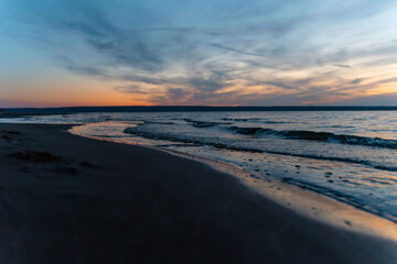 Sea waves at sunset, natural landscape