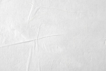 White paper with folds as a background.