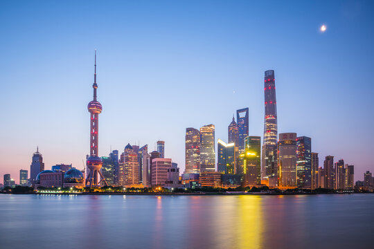 View of Shanghai skyline at night, view of the financial district along the Huangpu River, China.