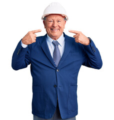 Senior handsome grey-haired man wearing suit and architect hardhat smiling cheerful showing and pointing with fingers teeth and mouth. dental health concept.
