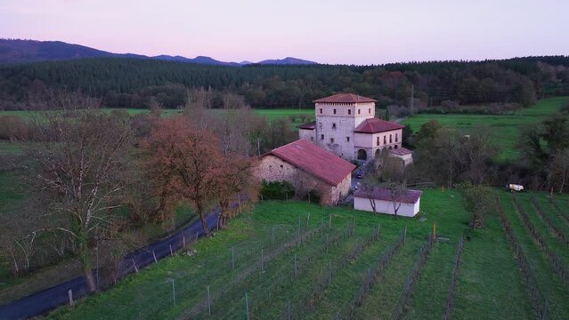 Sunset landscape at the Murga Tower seen from a drone. Ayala Valley in the province of Alava. Basque Country. Spain. Europe