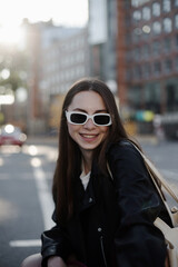 woman in sunglasses on the street. Summer